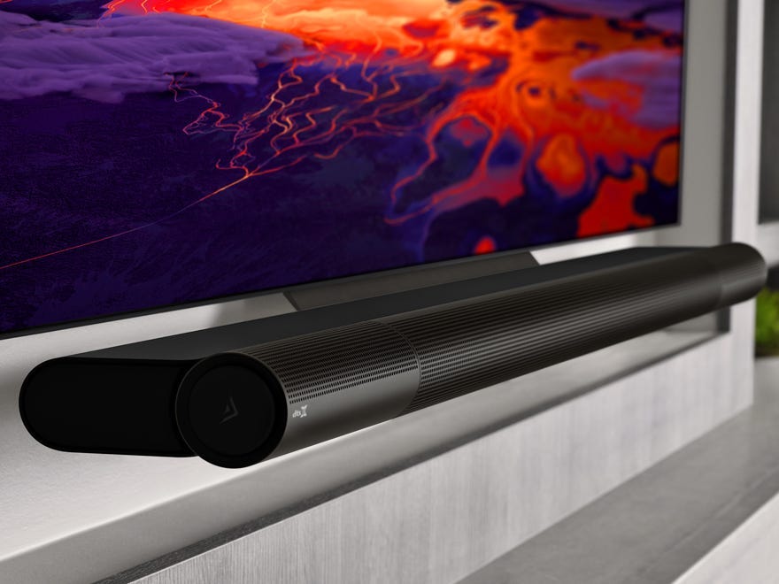 The VIZIO OLED TV and Elevate soundbar set up beneath a TV.