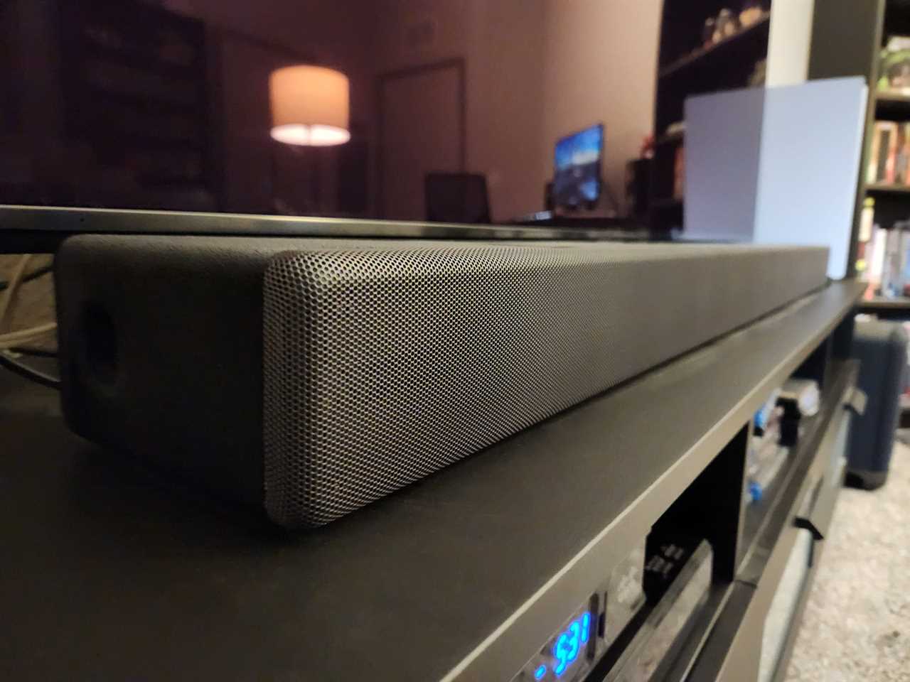 An angled view of a Sony HT-A7000 soundbar under a TV