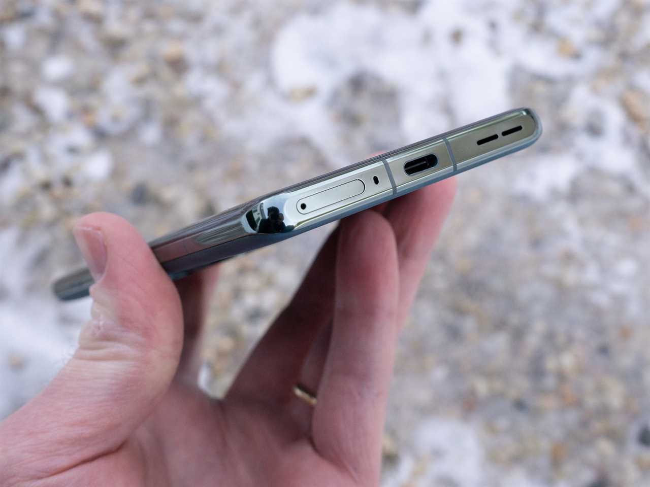 The bottom of the OnePlus 12, showing its USB-C charging port.