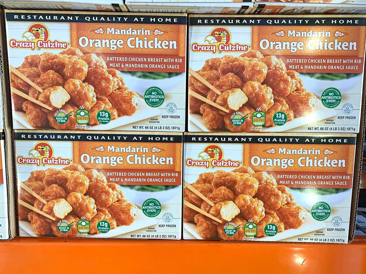 Boxes of Crazy Cuizine Mandarin-orange chicken on display at Costco.