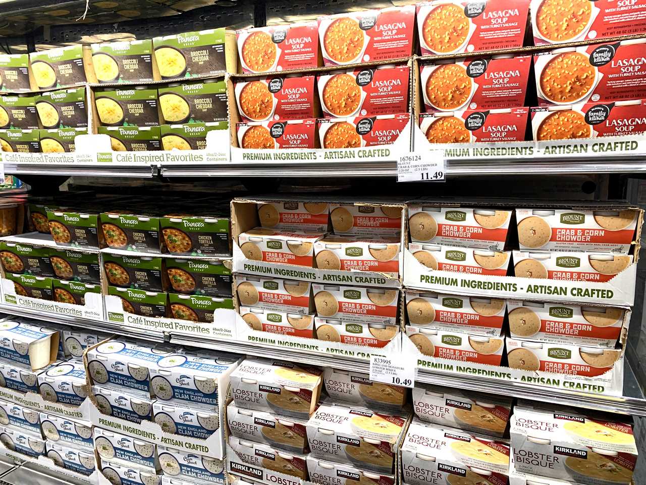 Six varieties of soup on display at Costco.