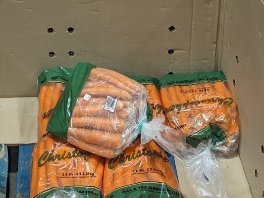 Carrots in a cardboard box at Costco