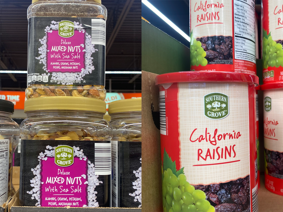 Clear container of mixed nuts with a black and purple label; Red container of California raisins with graphics of green grapes and raisins on the front