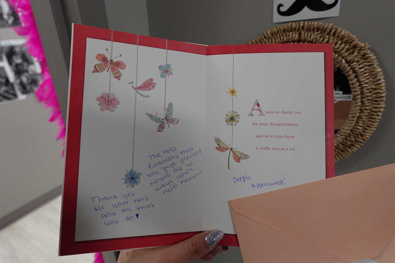 A photograph of a card delivered to the administrative team at Trust Women's