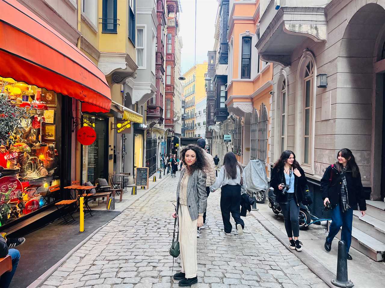 Author Maria Mocerino standing in a street in Istanbul smiling 