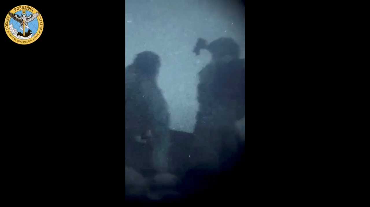 Ukrainian soldiers are seen on a boat during a 'special operation' by Ukrainian forces at a location given as near Olenivka and Mayak settlements, Crimea, in this screengrab obtained from a handout video released on August 24, 2023.