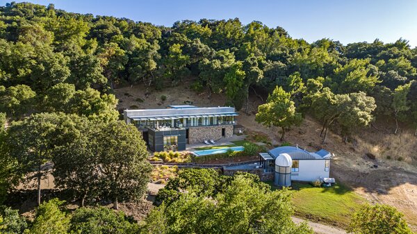 Known as Celestia Sonoma, the sprawling estate sits well off the road nestled into a hillside, and is enclosed by soaring trees to ensure ample privacy.