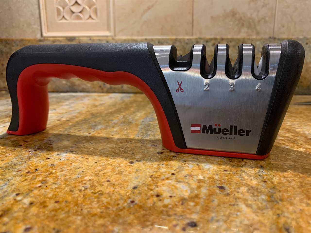 The Müeller 4-Stage Diamond Sharpener on a granite kitchen countertop.