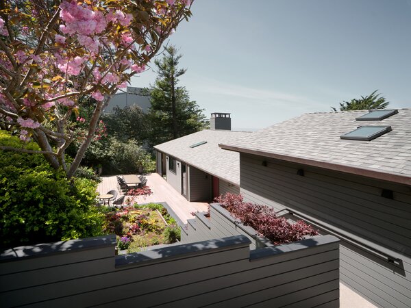 Roberta Gordon’s two story hillside home in San Francisco’s Westwood Highlands neighborhood, built by her father, has been adjusted by architect David Gast and interior designer David Bjorngaard for her to age in place. A staircase from the street below leads into the former basement, now reconfigured as an additional dwelling unit for a future caretaker.