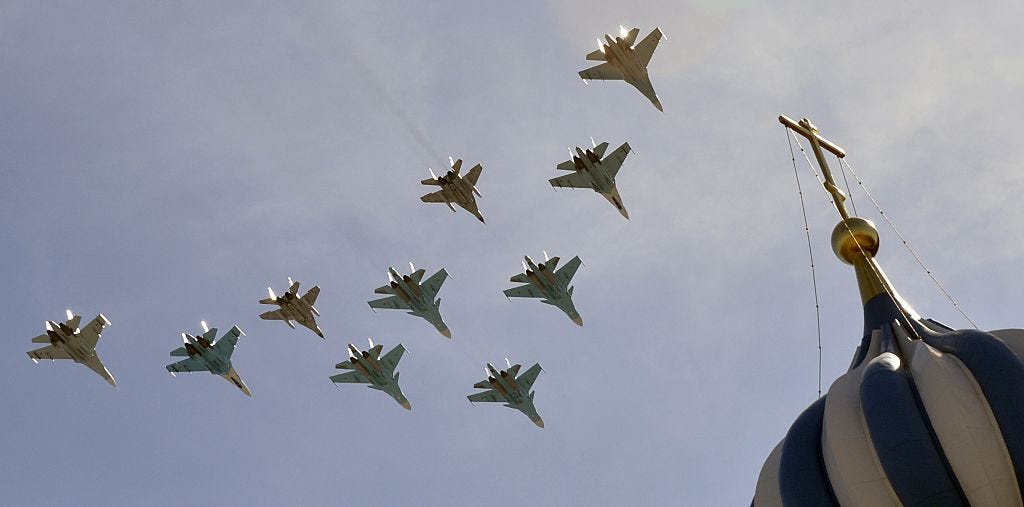 Russian Su-34 fighter bombers, Su-27 jet fighters and MIG 29 jet fighters fly above Moscow's Red Square, on May 7, 2015, during a rehearsal for the Victory Day military parade.