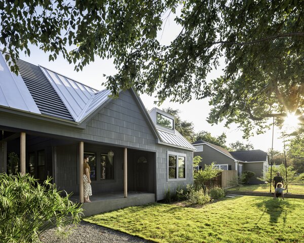 Although they could have extended their house forward on its lot, the Hugheses wanted to keep it in line with the houses on either side. They liked the neighborhood's scale and didn't want to stand out of proportion. A skylight above the living room was the first thing the couple added when they moved in 10 years ago.