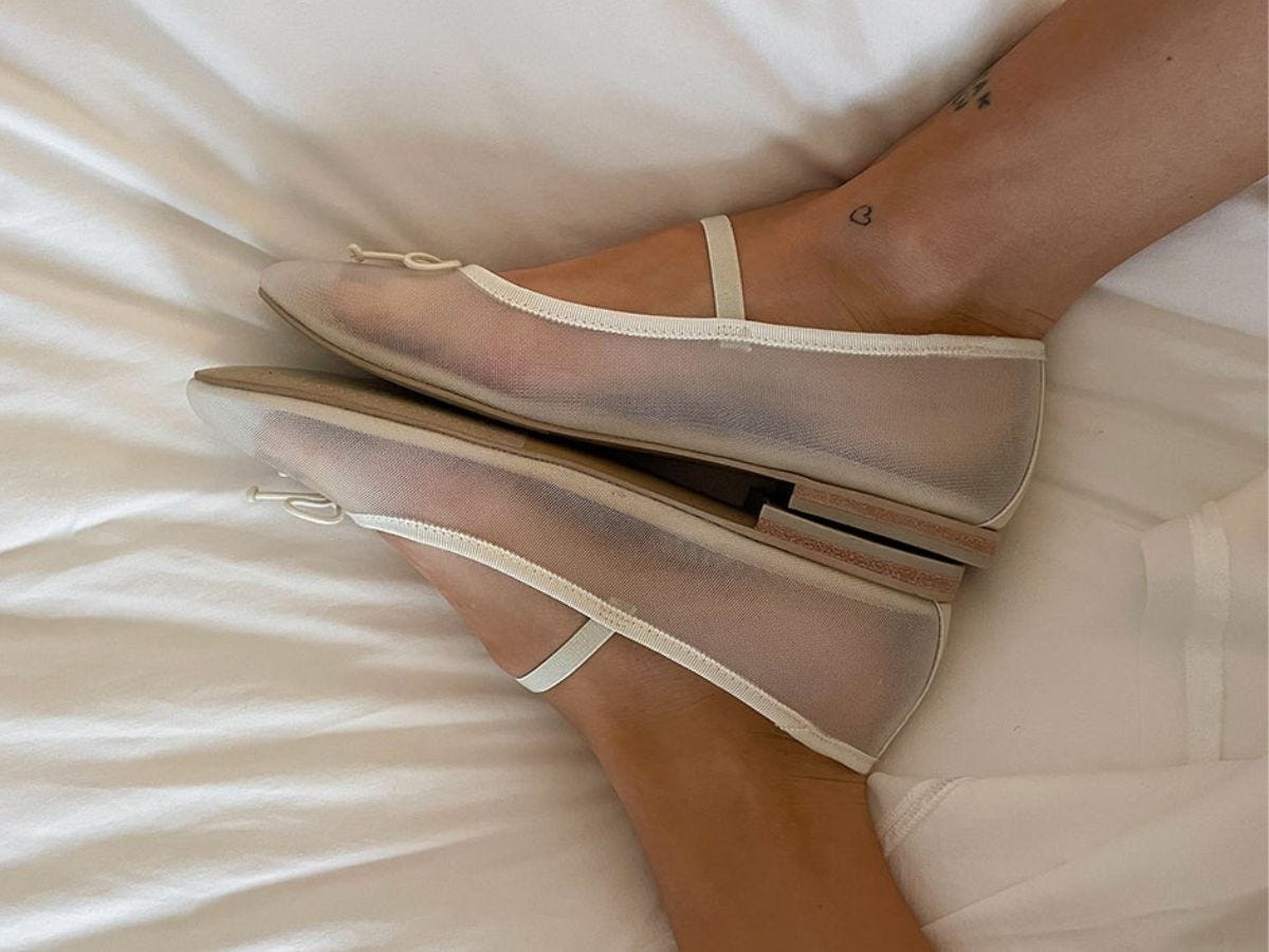 White mesh Dolce Vita Cadel ballet flats on model.