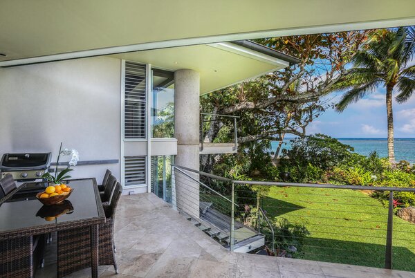 Spacious decks frame picturesque views of the nearby Anini Beach.