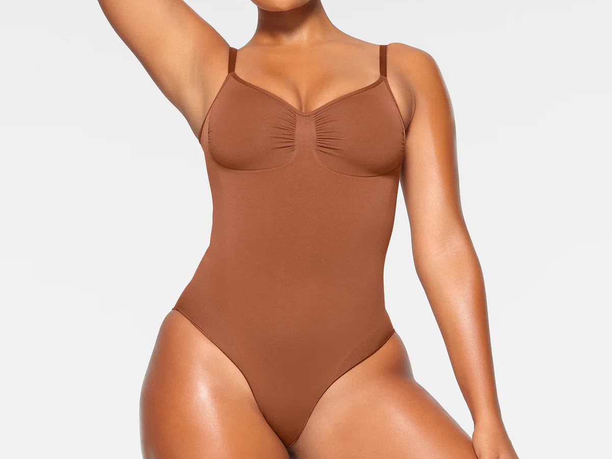 women wearing brown skims bodysuit