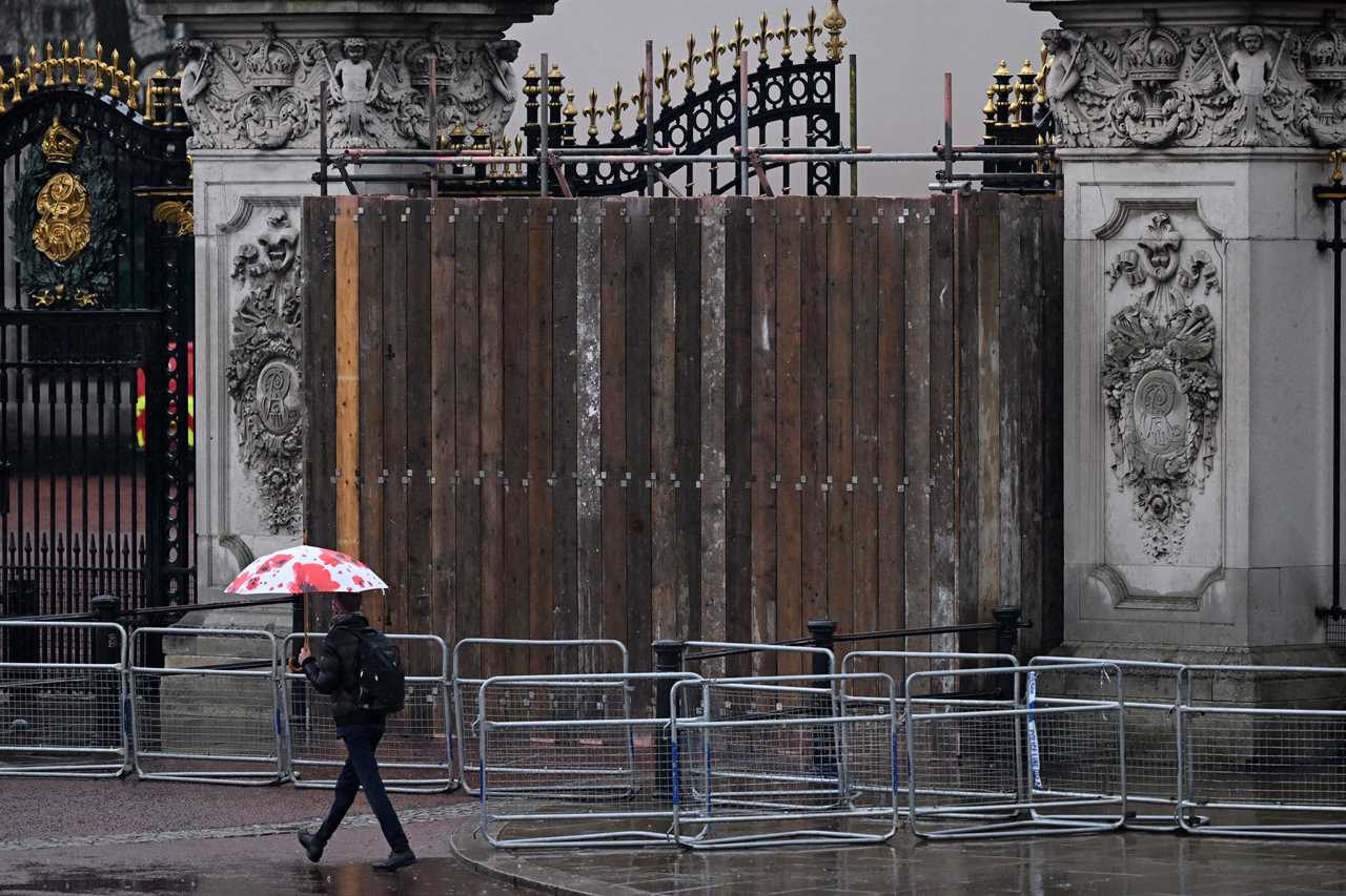 Police said a car crashed into the Buckingham Palace gates on Saturday.