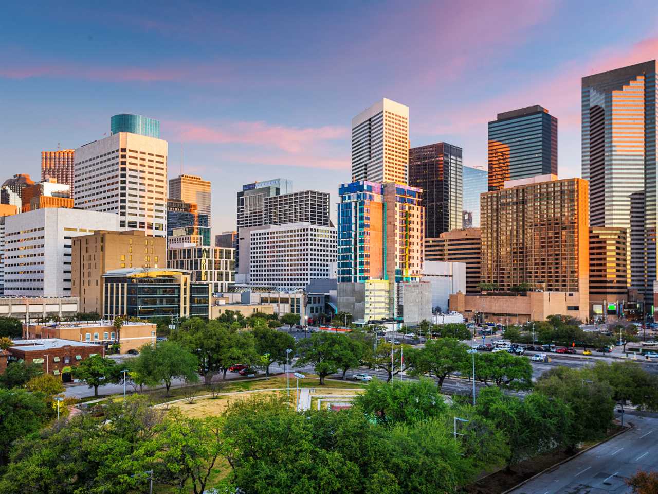 Houston, Texas, downtown park and skyline at twilight.