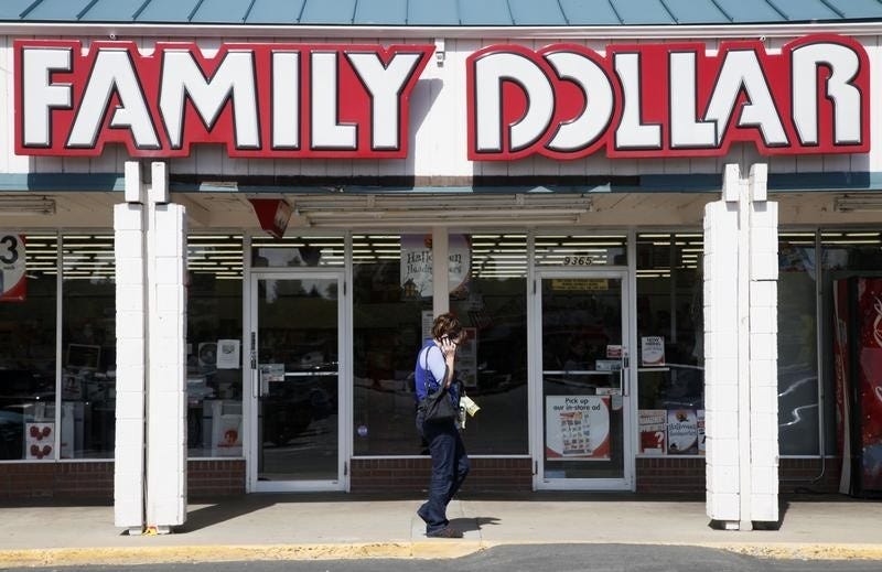 A woman walks by the Family Dollar store in Arvada, Colorado October 7, 2009.  REUTERS/Rick Wilking