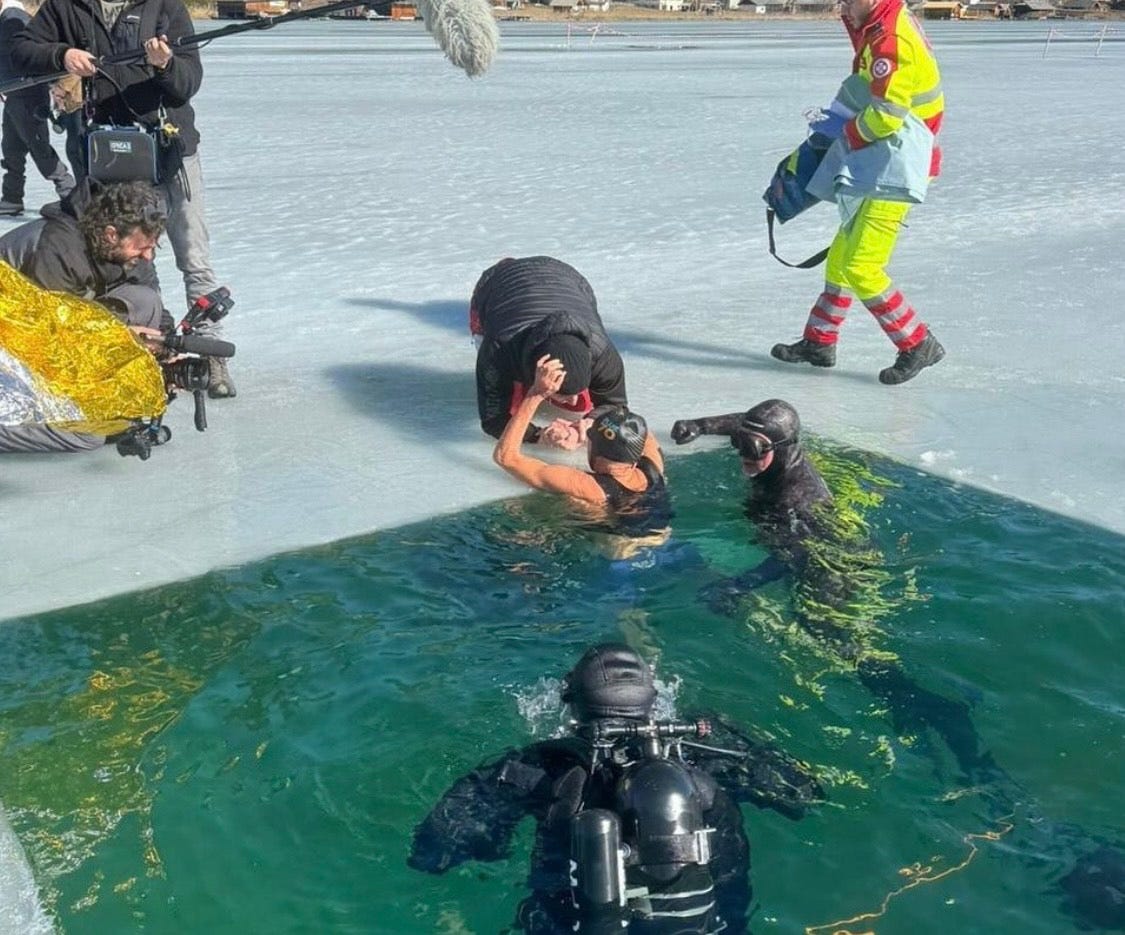 Michael C. Donaldson emerging from his under-ice swim.