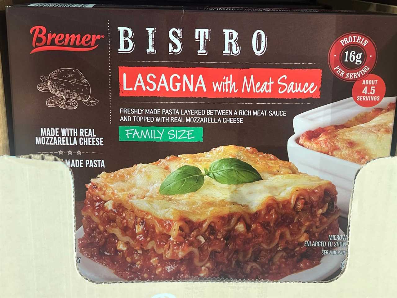 Bremer bistro lasagna with meat sauce in a brown box with an image of a slice of lasagna on a plate with basil garnish on box