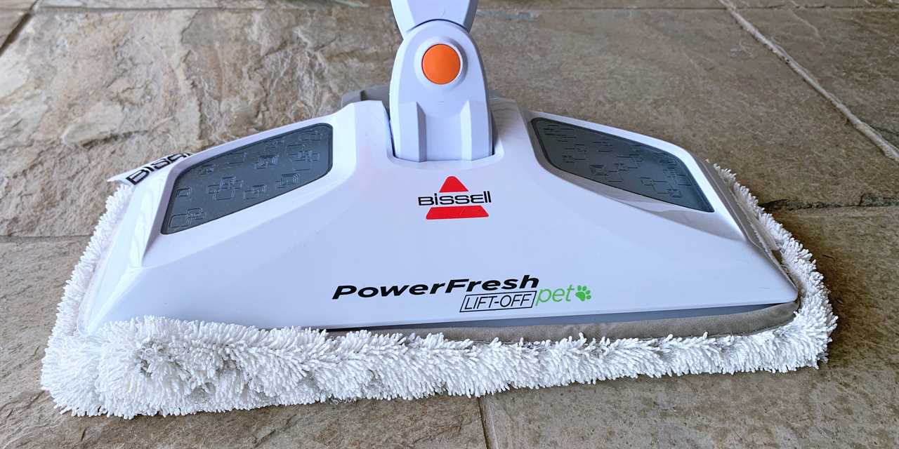 The mop head of the Bissell PowerFresh Lift-Off Pet is on a stone floor.