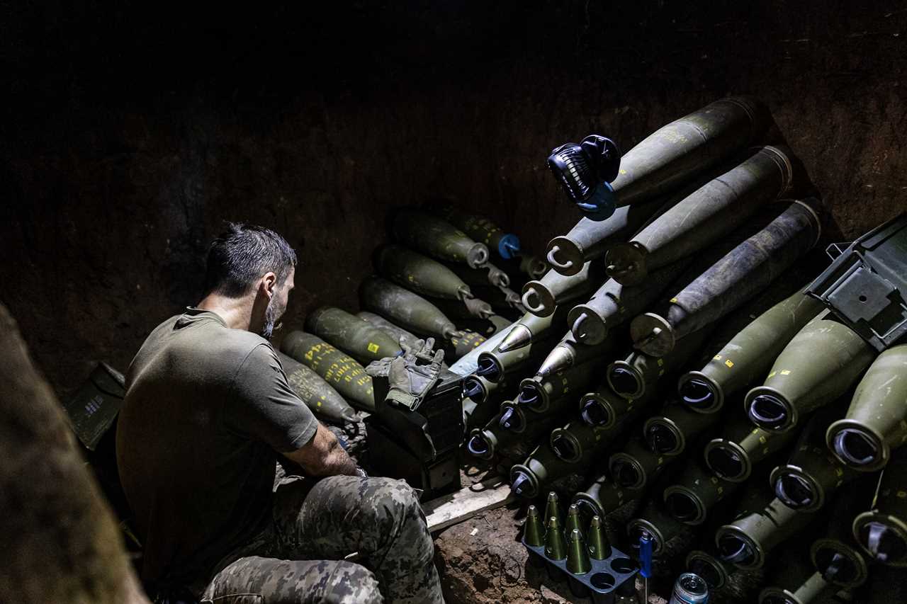 A Ukrainian soldier prepares 155mm artillery shells in his fighting position as Ukrainian Army conduct operation to target trenches of Russian forces through the Donetsk Oblast amid Russia and Ukraine war in Donetsk Oblast, Ukraine on August 6, 2023.