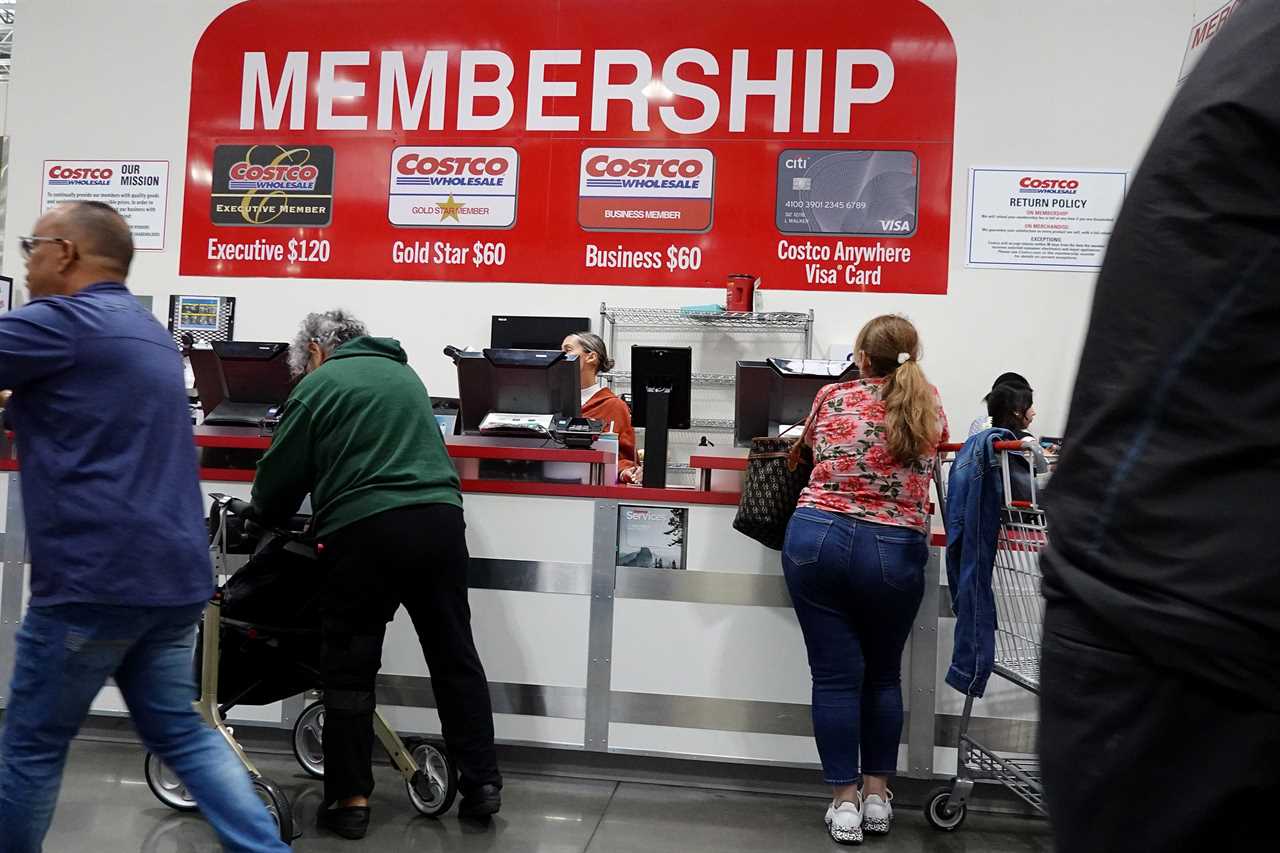 Costco shoppers at membership counter