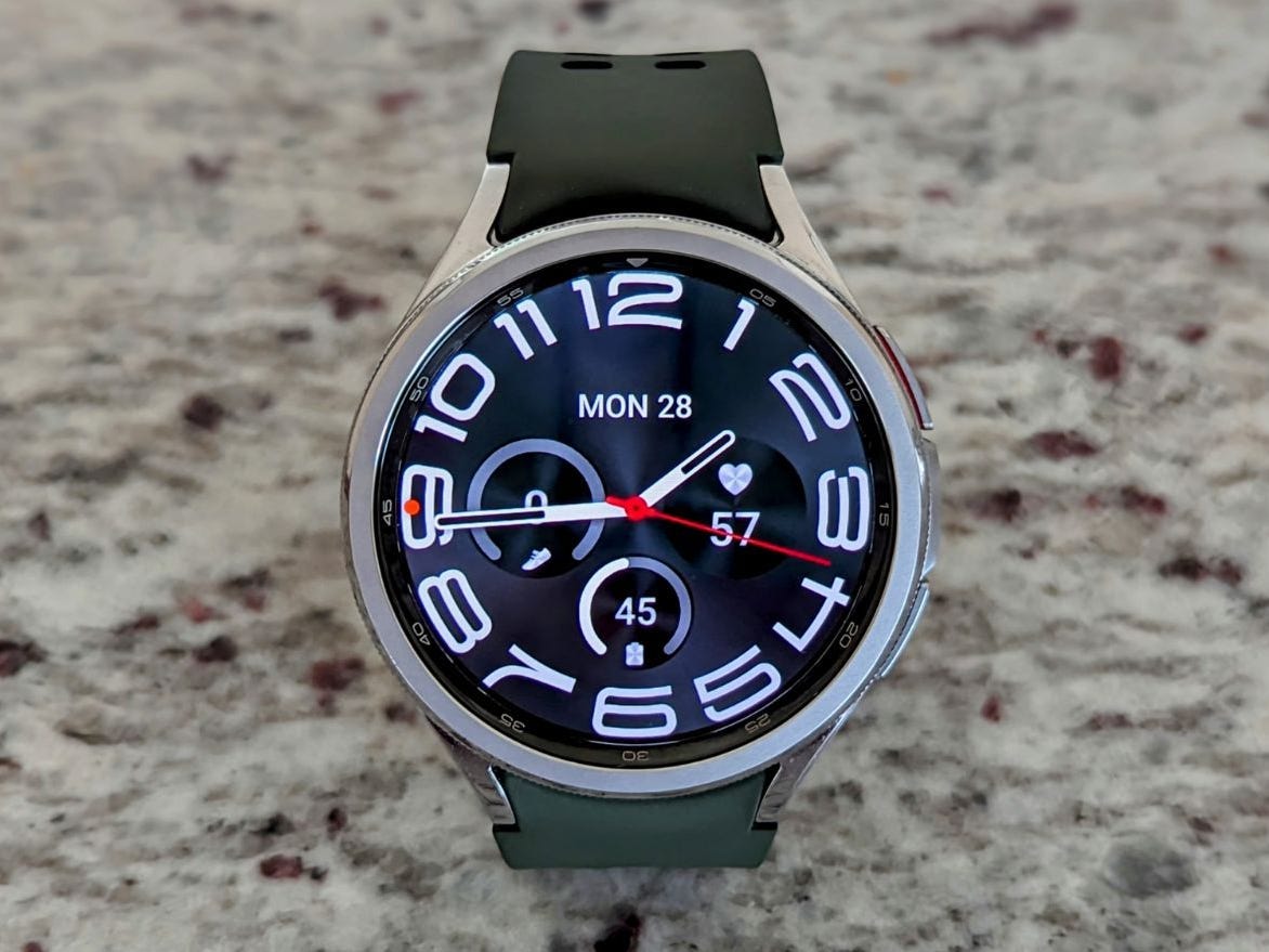 A Samsung Galaxy Watch 6 Classic sitting on a countertop.