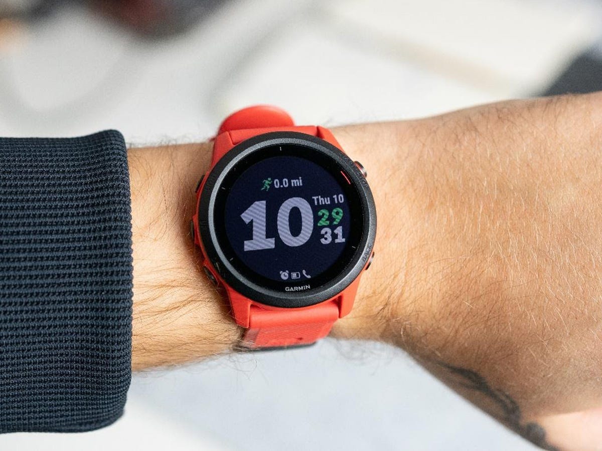 The Garmin Forerunner 745 smartwatch on a person's wrist.