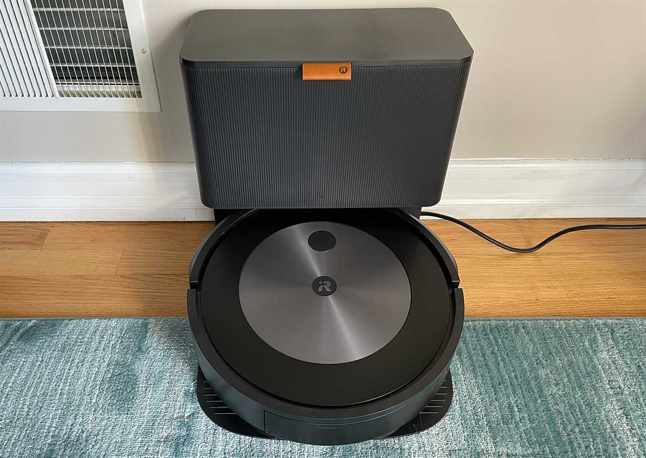 Roomba j7+ robot vacuum docked after cleaning