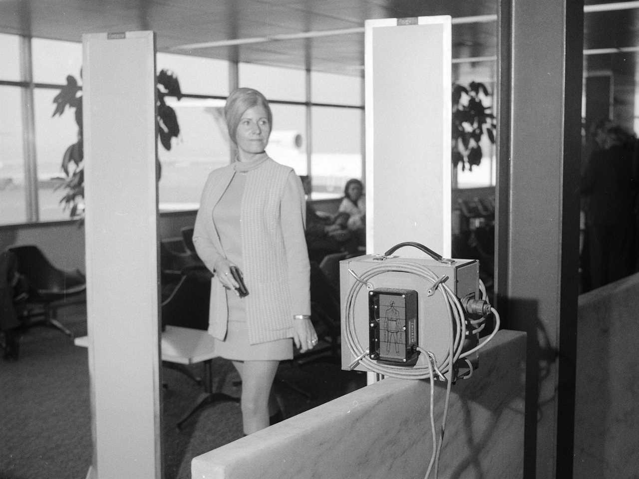 An airport metal detector in 1971.
