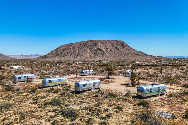 Known as Kate's Lazy Desert, the Airstream retreat is situated just a short drive away from numerous local attractions, such as Joshua Tree National Park and Pappy and Harriet's.