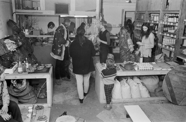 Alternative spring fair in Kosmos by Gnomes, Amsterdam; sale of biodynamic food, February 6, 1971, fairs, The Netherlands, 20th century press agency photo, news to remember, documentary, historic photography 1945-1990, visual stories, human history of the Twentieth Century, capturing moments in time.