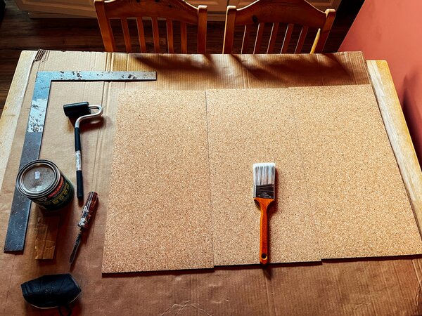 The backside of the cork, ready for glue. You can find water-based concrete cement, and j-rollers, at many hardware stores.