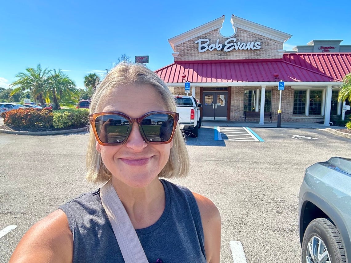 Author Teri Peters in front of Bob Evans