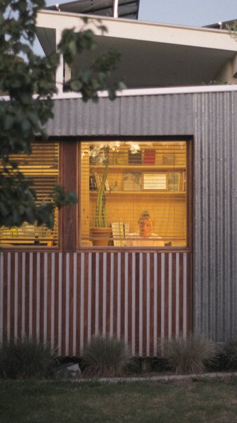 The west-facing window of this Australian work-shed gets plenty of morning light. 