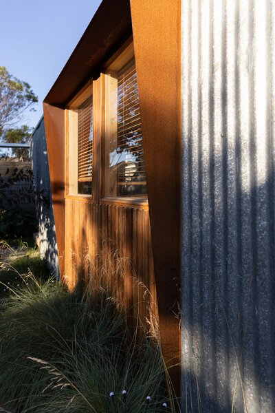 The old roofing became the new cladding. 