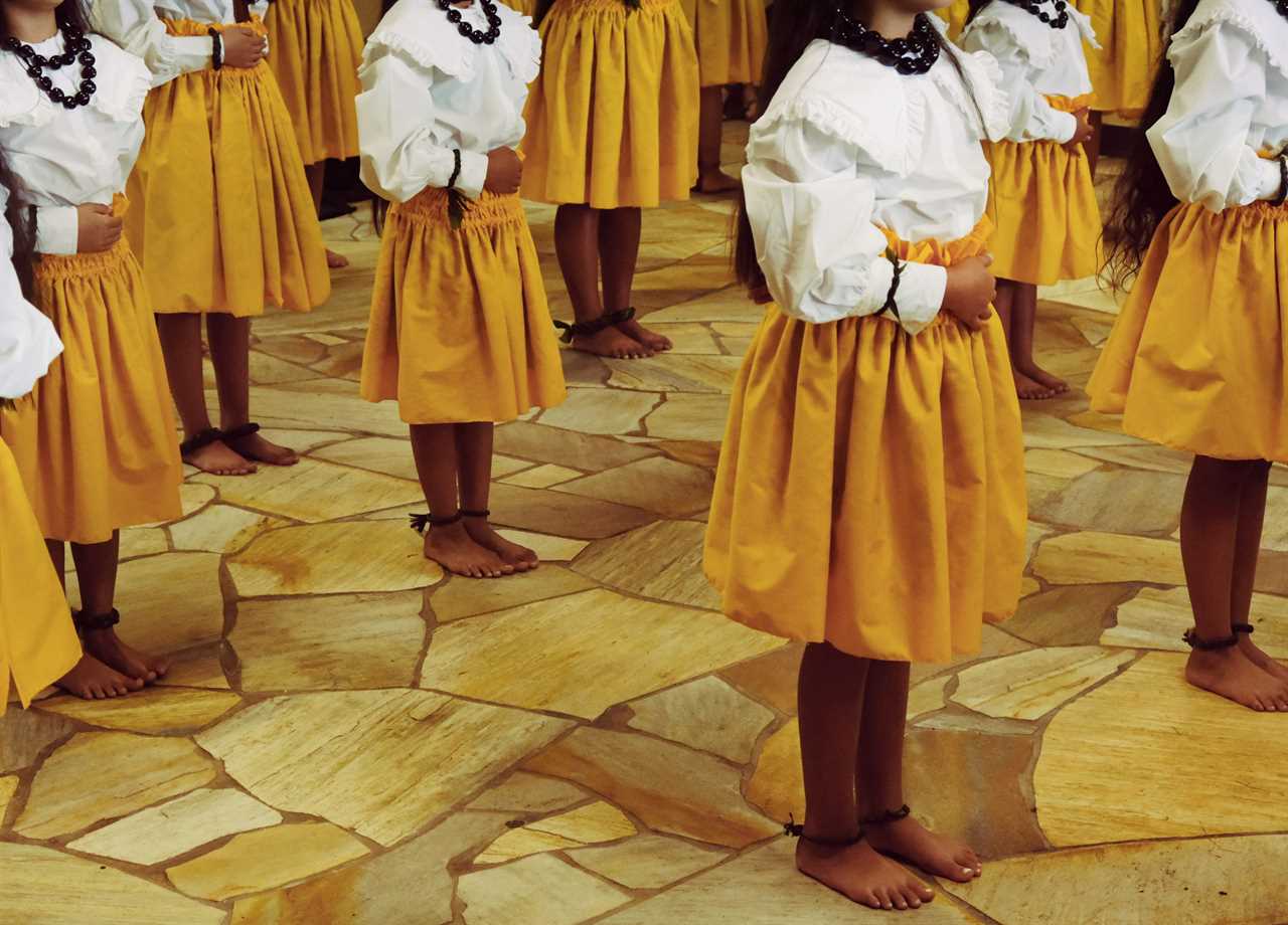 Girls performing in costume.