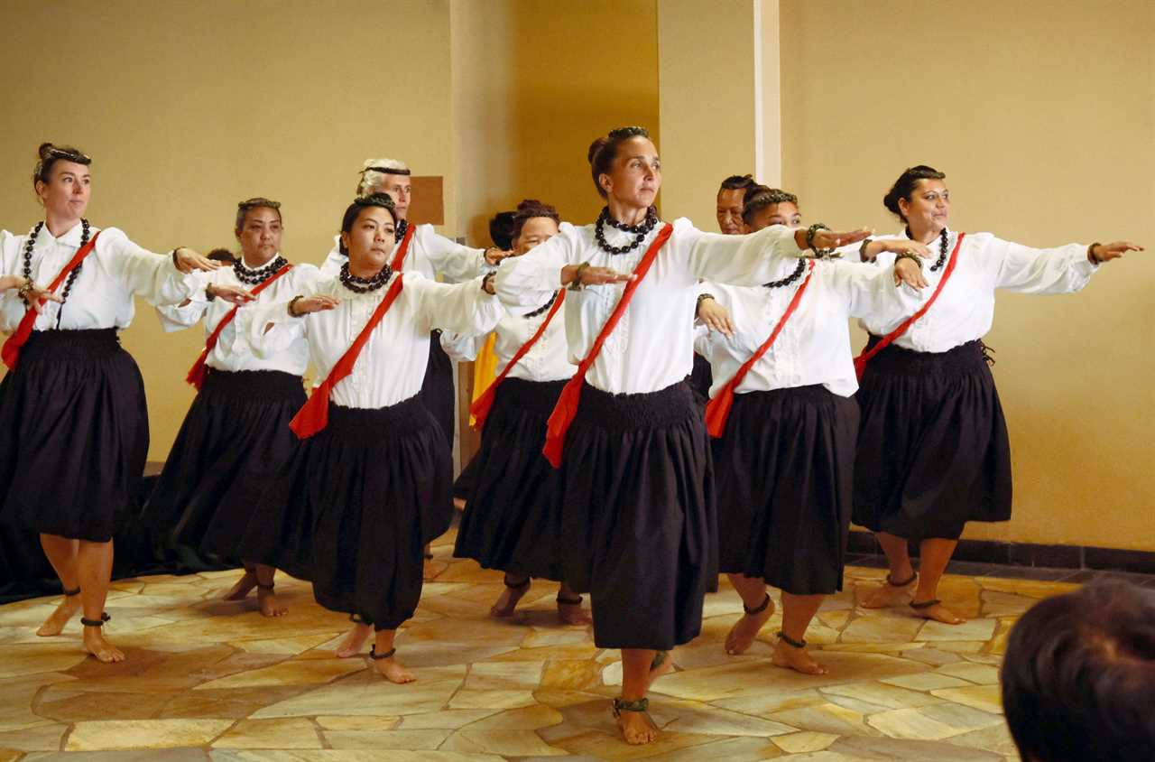 Women performing at event a traditional dance.