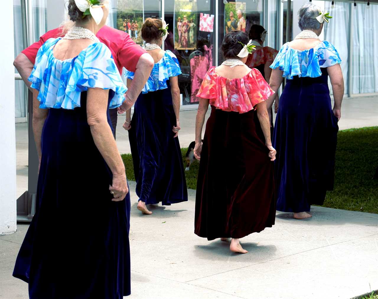 Women in costume at a dance performance.