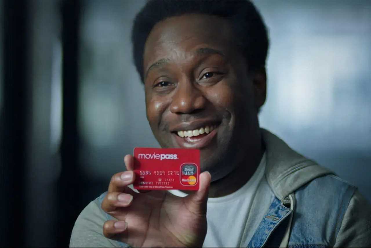 Man holding MoviePass card