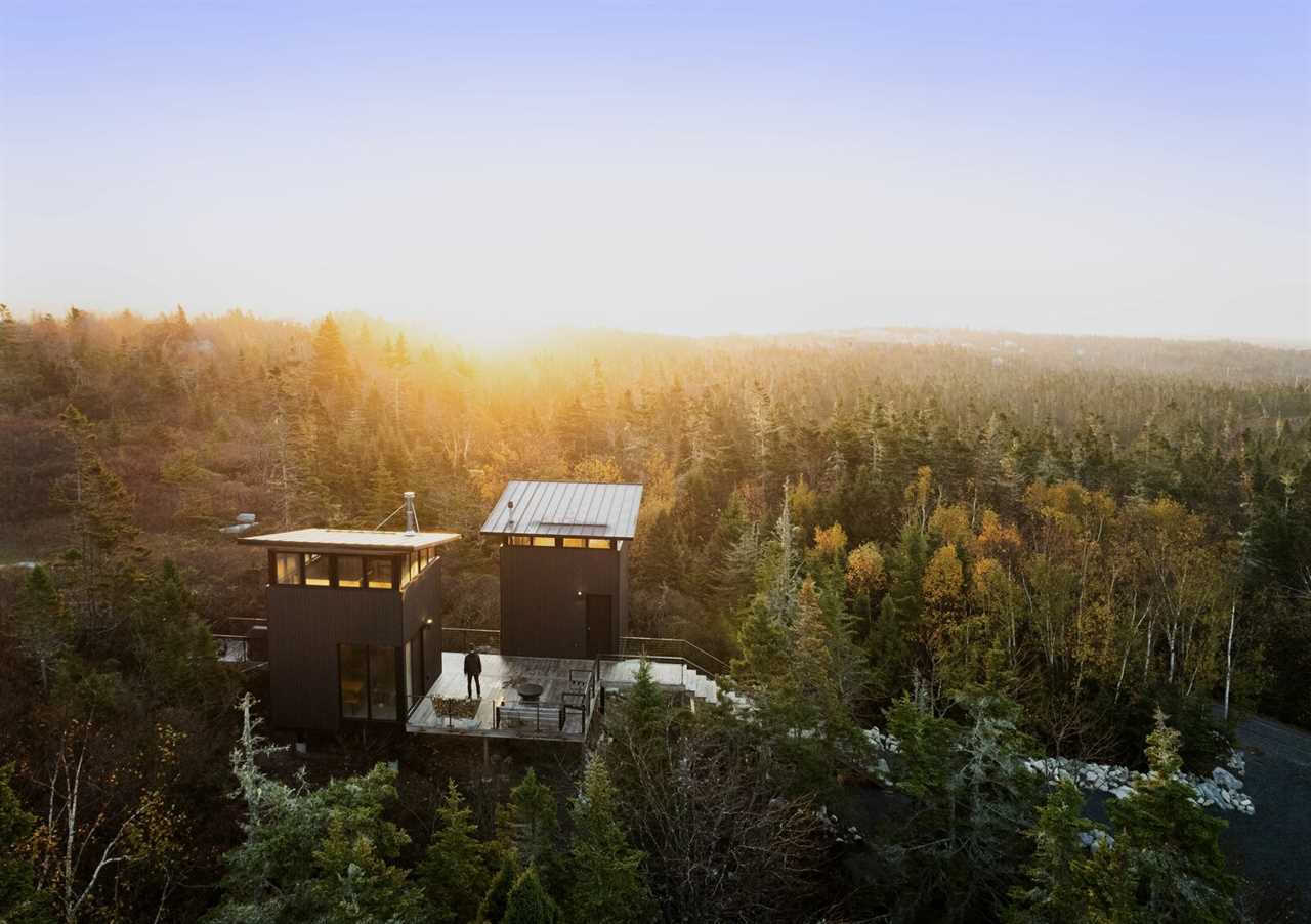 Camping Turned Into Glamping After a Family Built Twin Tiny Cabins in the Woods