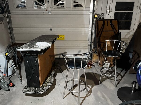 The bar and matching bar stools, awaiting their final home after a clean.