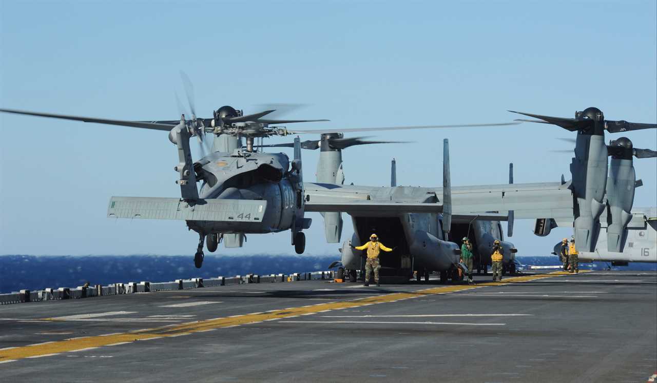 Atlantic Ocean, December 12, 2013 - An SH-60 Sea Hawk helicopter lands on the flight deck aboard the multipurpose amphibious assault ship USS Bataan (LHD 5).