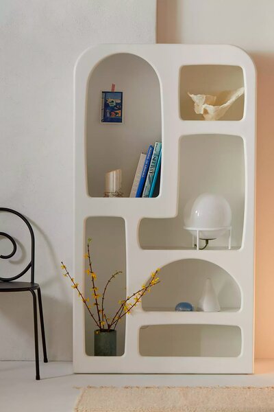 <span style="font-family: Theinhardt, -apple-system, BlinkMacSystemFont, &quot;Segoe UI&quot;, Roboto, Oxygen-Sans, Ubuntu, Cantarell, &quot;Helvetica Neue&quot;, sans-serif;">The Stone Age-inspired faux stucco bookshelf from Urban Outfitters’ Isobel line, which includes a coffee table, sofa, and wall shelf.</span>