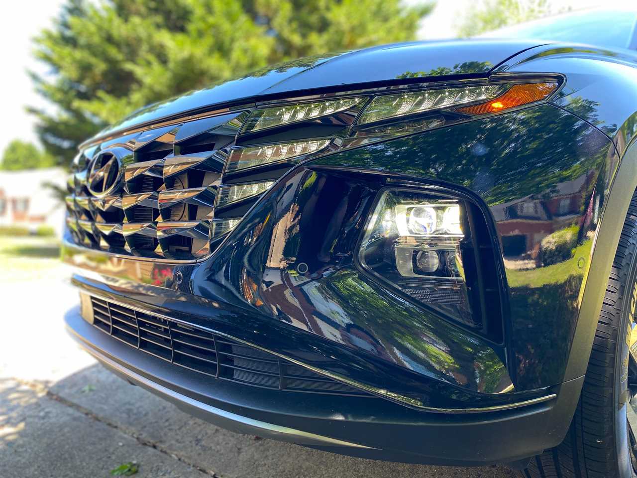 A close-up of the Hyundai Tucson Hybrid's LED headlights.