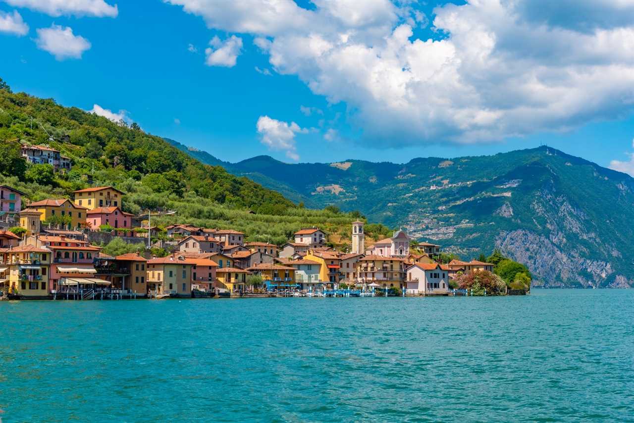 Colorful houses line the side of Monte Isola, an island on a lake in northern Italy.