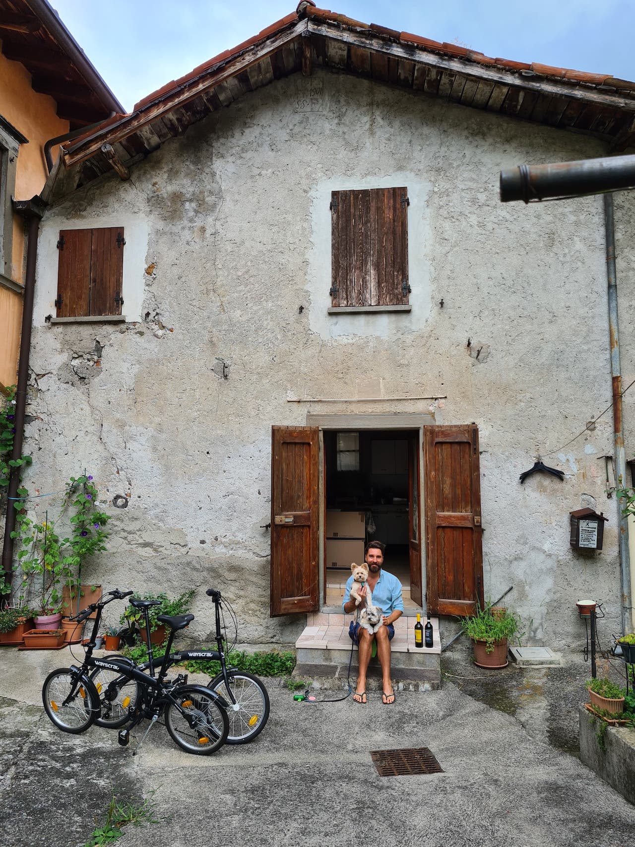 Paul Cordier sitting outside his and Kristina Knighten's home in Italy.