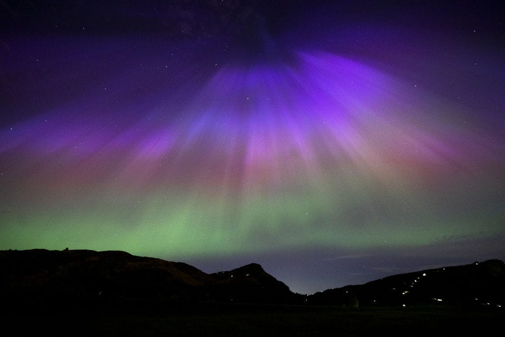 orthern lights, above Arthur's Seat and Salisbury Crags in Holyrood Park, Edinburgh.