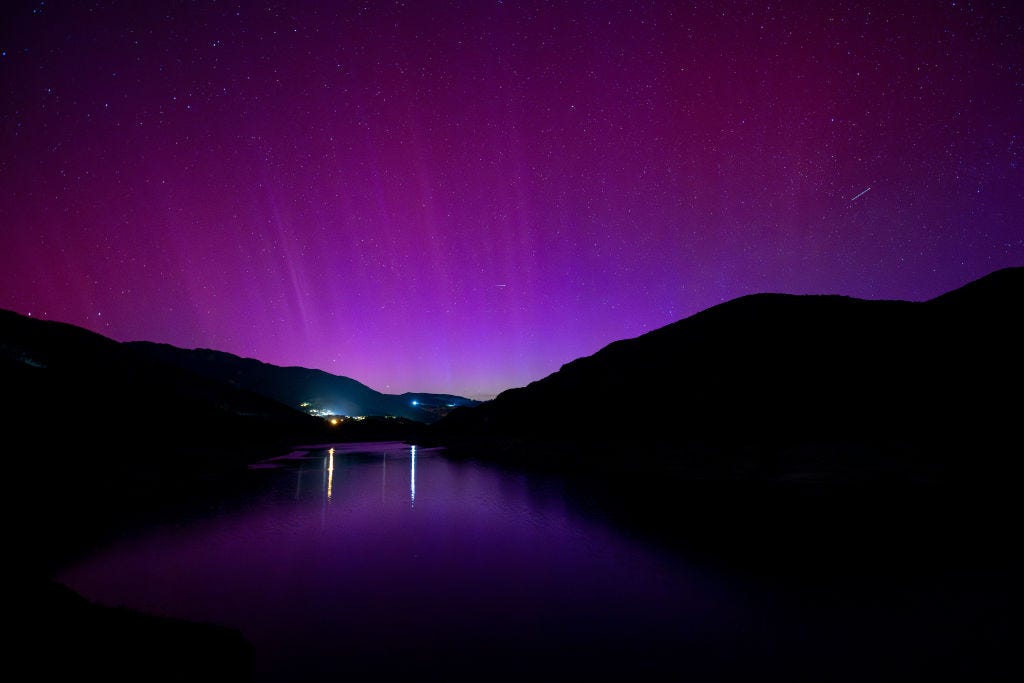 CERCS, BARCELONA CATALONIA, SPAIN - MAY 11: Aurora borealis from the Baells reservoir, May 10, 2024, in Cercs, Barcelona, Catalonia, Spain. Catalonia recorded aurora borealis last night, May 10, to today. An aurora borealis is produced by a very powerful solar storm, which collides with the Earth's magnetic field. To the north of the Earth these phenomena can be seen more easily, but on this occasion they have been seen in several points of Spain, Europe and even Africa, where it is very rare to be recorded. (Photo By Lorena Sopena/Europa Press via Getty Images)