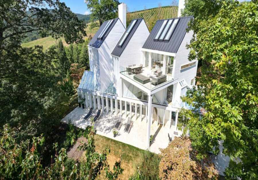 High in the Blue Ridge Mountains, a Snow-White ’80s Home Seeks $2.5M
